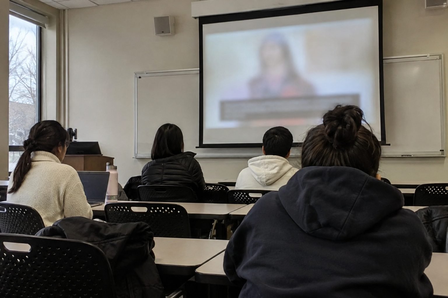 A large lecture hall during a presentation